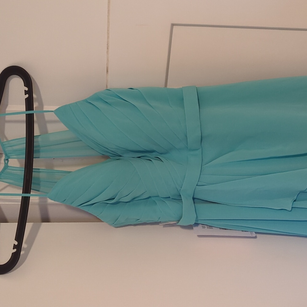 Azazie Dawn bridesmaid dress new with tags. Size 8. Color is "Spa"